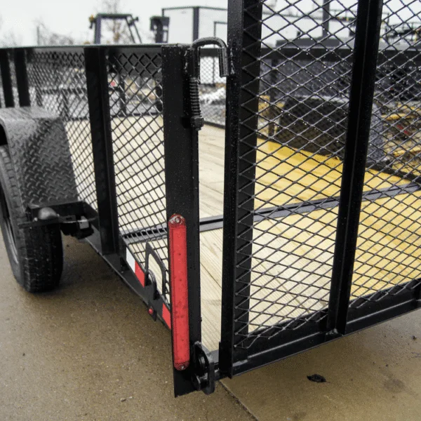 5-12-dovetail-utility-trailer-with-2ft-mesh-sides-3-500lb-axle-13.webp